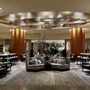 There is bar seating, tables and outdoor seating just beyond the lobby.