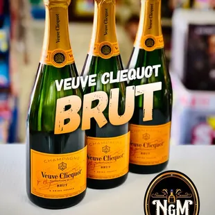 three bottles of brut