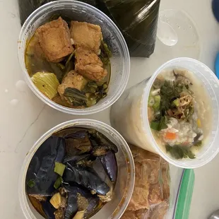 Top banh gio 2/$5, than there&apos;s the tofu and eggplant both $6, right is porridge w fried crueler.  All tasty and delicious!