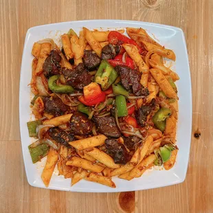 Stir-fry pasta w/Cubed beef filet mignon
(Nui Bo Luc Lac)