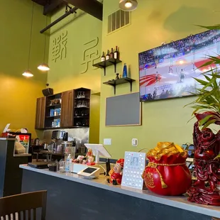 a restaurant counter with food on it