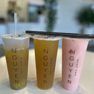 three different drinks on a table