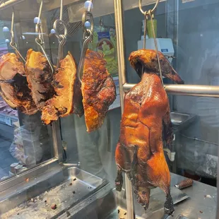 meat hanging from a rack