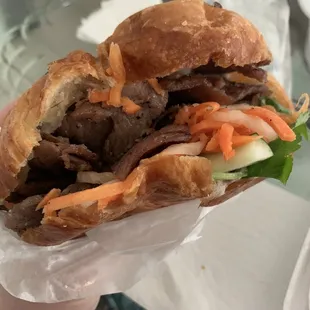 Croissant banh mi with grilled meat