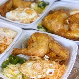 a tray of fried chicken and rice