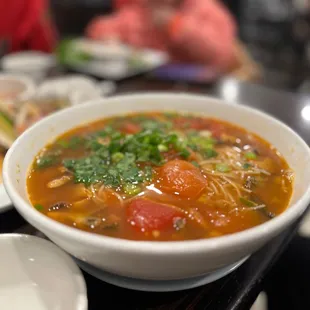 a bowl of soup on a table