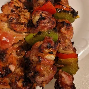 Grilled chicken and pork skewers