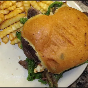 Steak sandwich which was okay &amp; crinkly fries which were not so much.