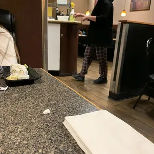 Server wearing pajamas.