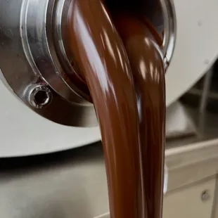 a close up of a chocolate fountain