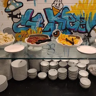 Snacks and orange slices on display