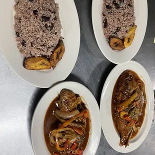 Brown stew snapper with rice and peas