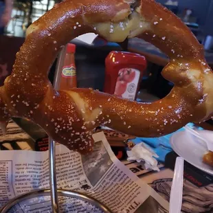 Pretzel appetizer with cheese sauce