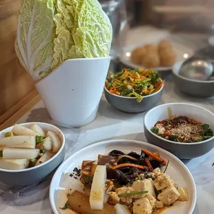 Unlimited sauce and appetizers from the bar ($2.99 per person) and white bowl of Napa cabbage ($5.99)