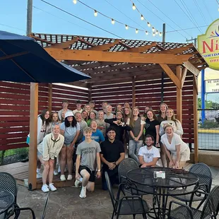 a group of people posing for a picture