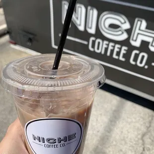 Iced chai latte with oat milk