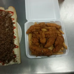 LG 15 inches steak and cheese and a chicken fingers dinner