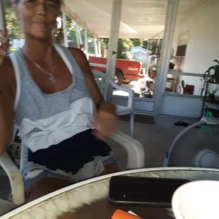 a woman sitting at a table