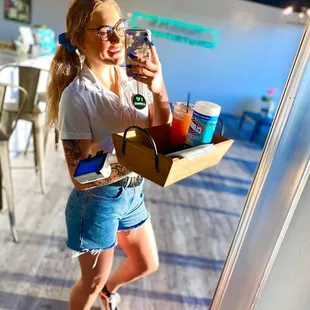 a woman taking a selfie