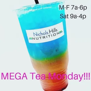 a blue drink with a straw