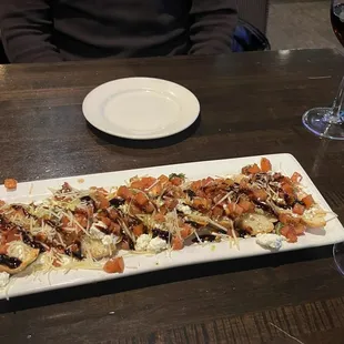 Tomato Bruschetta. Really good! And only $6 during happy hour (: