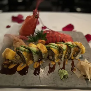 a plate of sushi rolls