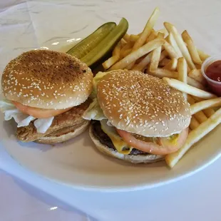 two burgers and french fries