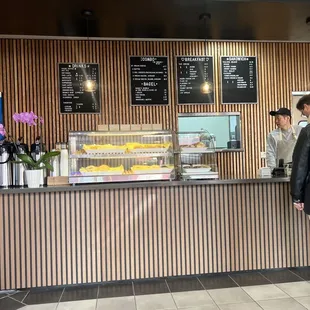 a man standing at the counter