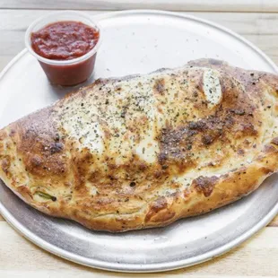 Italian Calzone! Filled with fresh sliced Italian Meats!