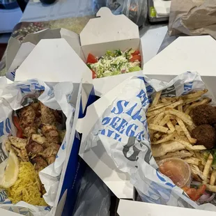 Here's what we got for standing 2 hours to get a free lunch ! Souvlaki plate with Greek salad on the side and a fountain drink lemonade.