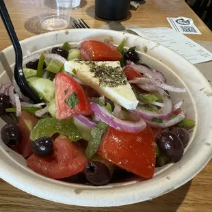Greek Salad, very good but I wish instead of a chunk of feta they would crumble it inside the salad