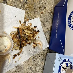 Burnt pita bread and fries