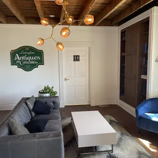 a living room with couches and a coffee table