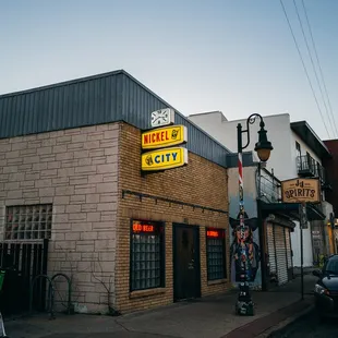 Outside Nickel City at dusk.