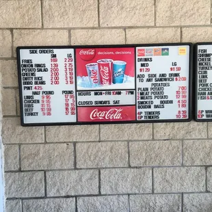 menus on a brick wall