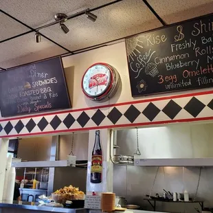 a restaurant with a clock on the wall