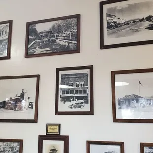 a wall full of old photos