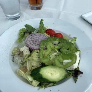 Greek Salad...look at that feta! Fresh pepper offered table side, a nice thing indeed!
