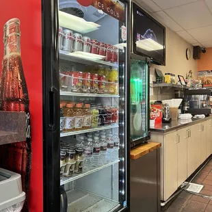 Fridge of drinks, half and half on the bottom left corner