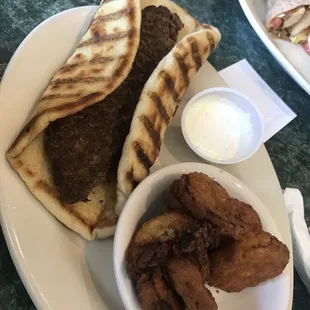 Patti melt on pita bread with fried squash
