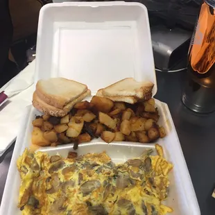 Omelette with mushroom and cheese home fries toasted Scali