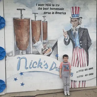Grandsons favorite place after school. He saw the picture of people in front of sign and wanted one too.