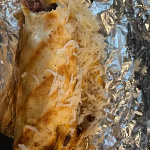 This is supposed to be a burrito. Ordered to go, pretty sloppy when I opened it up to eat it. Disappointed.