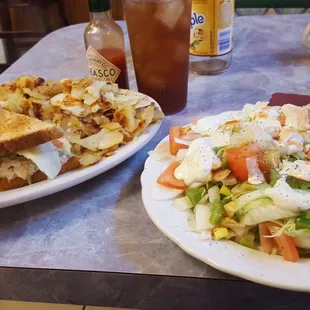 Tuna sandwich with salad on the side