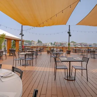 Fit up to 100 people for a happy hour event on our patio - its free to reserve!