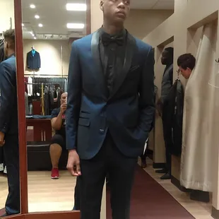 At Nick's getting prom fitted with my kiddo.