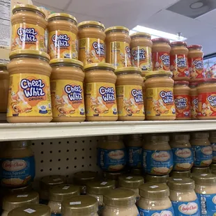 a shelf full of peanut butter