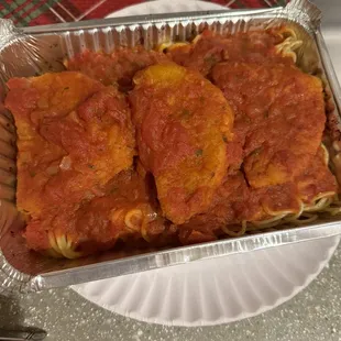 Chicken cutlets with pasta.