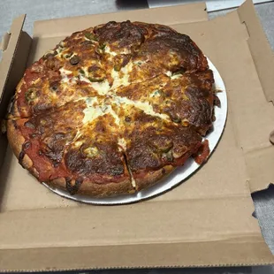 a pizza in a pizza box