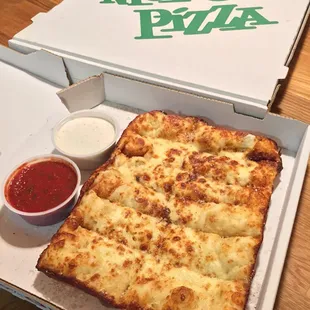 Cheesy bread. Not brushed with garlic butter like Green Lantern Pizza.